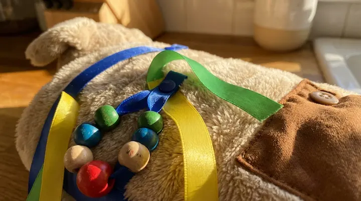 Close-up of sleeve textures and beads